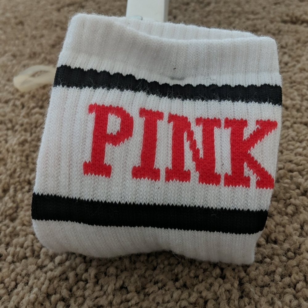 Victoria's secret pink knee high athletics socks.